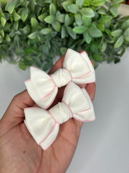 little pair of bows small white